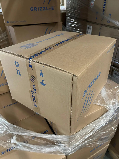 Stacked cardboard boxes containing Classic Connect 40A 9.6 kW Level 2 EV Charger For Home Use With Wi Fi Enabled Smart Wall Station