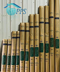 Heavy Duty 9 X 100 Foot Charcoal Fiberglass Mesh Screen With 20x20 No See Um Build displayed in rolls on a rack.