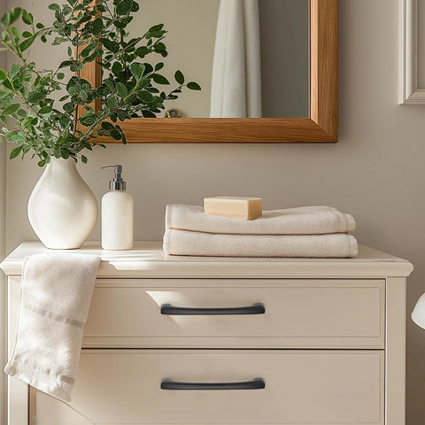30 Pack 5 Inch Hole Center Kitchen Cabinet Handles Curved Black Zinc Alloy Drawer Pulls installed on ivory dresser