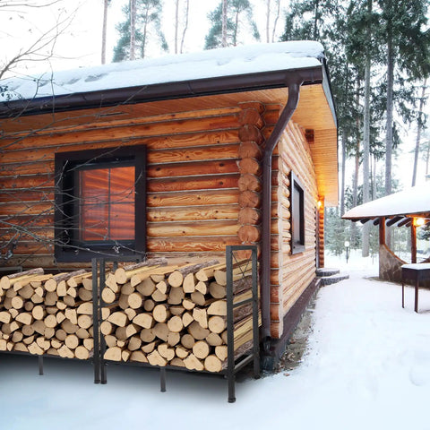 Built Tough Heavy Duty Firewood Rack For Indoor And Outdoor Use 2ft Log Storage Holder beside cabin in snowy setting