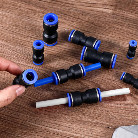 100 Piece Quick Connect Air Hose Fittings Set in Five Sizes with quick release connectors and 2 way adapters on wooden surface