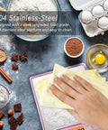 Hand cleaning 0.01g High Precision Kitchen Scale With 500g Capacity Portable Digital Scale LCD Display on kitchen counter.