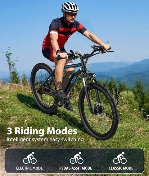 Man riding All Terrain Electric Mountain Bike For Adults 1200W Peak Power Beast 28 MPH Top Speed 26 By 2.1 Inch Tires