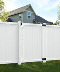 6ft High No Dig Privacy Gate Kit 4ft Wide White Vinyl Fence Gate With Hardware Included For Yard And Garden Durable Outdoor Gate For Easy Fence Install And Backyard Privacy installed in a backyard setting against a house.