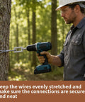 Person using a 2 Piece Wire Twister Drill Bit Set 1/4 Inch Hex Shank for electrical connections on a tree.
