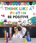 Child in lab coat with colorful test tubes under bulletin board from 56Pcs Science Bulletin Board Decorations Set With Lab Themed Cutouts.