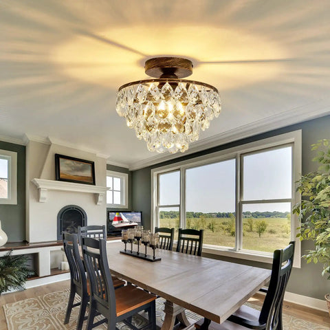 Crystal Chandelier Semi Flush Mount Ceiling Light in Oil Rubbed Bronze illuminating a modern dining room with natural light.