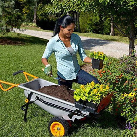 Woman gardening with 8 in 1 Heavy Duty Aerocart Garden Cart Wheelbarrow Dolly with Turbo Lift Design and Flat Free Tires