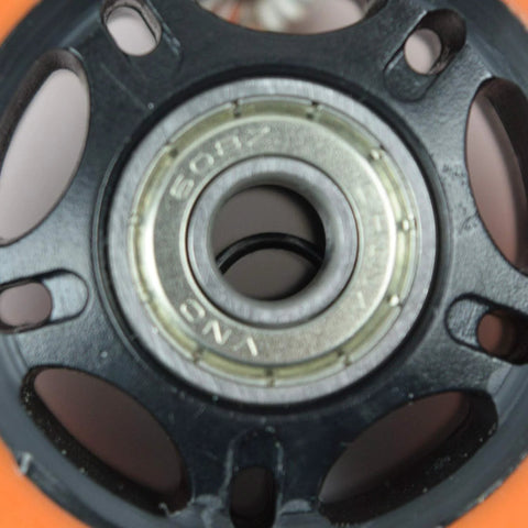 Close-up of inline skate wheel with 608 bearing and 8mm axle, featuring 8mm Bearing Spacers for Inline Skates Set to Increase Spin Speed