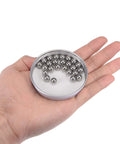 Hand holding tin of 8mm Bearing Balls 304 Stainless Steel G100 Precision Balls 25pcs