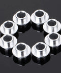 8-Pack Inline Skate Bearing Spacers For 8mm Axles Aluminum Wheel Center Spacers arranged in a circle on black background