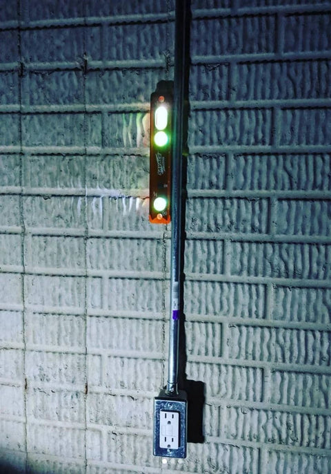 Savage Lightning Aluminum Torpedo Magnetic Illuminated Level Nine Inch With BrightView Readability And Three Vials on a wall