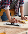 Person using Magnetic Torpedo Level 9 Inch With Box Frame And Alloy Construction, Hands Free Magnetic Attachment For Fast Readouts On Iron Surfaces.