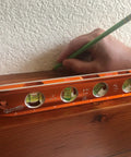Savage 9 Inch Magnetic Torpedo Level With Four Neodymium Magnets And Four Vials For 30 Degree Conduit Bends Built From Solid Aluminum For Lifetime Durability Bright Orange Finish For Easy Visibility On Any Job Site on wood surface