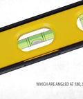 Close-up of a compact 9 inch torpedo level with magnetic base, showing three 360 degree vials for accurate layout checks.
