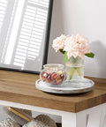 9 Inch Solid Wood Lazy Susan Turntable Organizer For Cabinet And Pantry Storage Round Natural Wood With White Washed Finish on table
