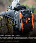 Photographer wearing Impact-Resistant Hardshell Camera And Drone Backpack With External Mounting System For Photographers, Content Creators And Drone Pilots, Rugged Water-Repellent Case, Multi-Compartment Organization, Go-To Grayman-Style Gear Carrier, showcasing customizable orange exterior.