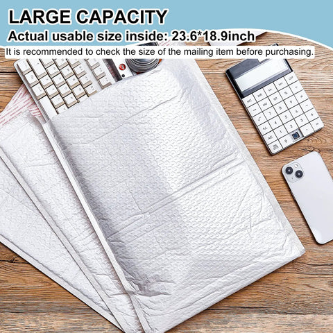 10 Pack Extra Large 20x24 Inch Bubble Mailers With Poly Padding Waterproof And Tear Resistant Adhesive Closure Mailing Bags next to keyboard and calculator