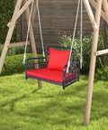 Red Wicker Porch Swing Chair For One With Cushioned Seat And Back, Reinforced Metal Frame in garden setting
