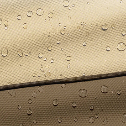 Close-up of water drops on 108 Inch Patio Table Cover With Umbrella Hole For Rectangular And Oval Tables Pebble Color Outdoor Table Cover Fits 6 Chairs Water Resistant Fabric System Durable Weatherproof Protector For Patio Furniture