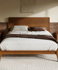 Queen Size Bamboo Platform Bed Frame With Tall Headboard Packed With Upgraded Metal Support Legs For Unbreakable Stability And A Sleek Rustic Look That Brings Badass Vibes To Your Bedroom While Keeping Things Solid As A Rock With Ease in a cozy styled bedroom.
