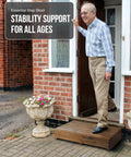 Six Point Five Inch One Step Stool For Seniors And Adults With Walnut Wood Finish in use outdoors by a man at entryway.
