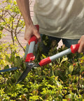 ComfortGel Hedge Shear With 9 Inch Blade For Precision Cutting Of Hedges Shrubs And Bushes in use by a gardener