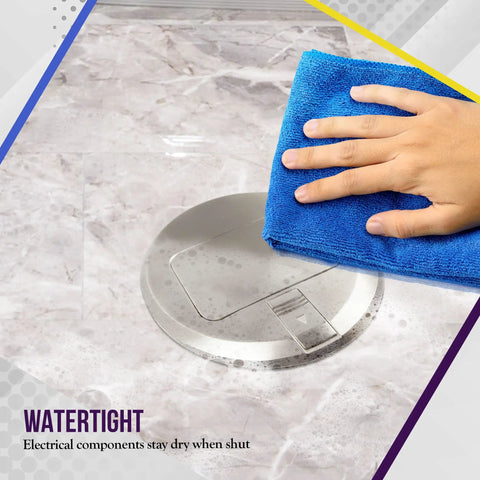 Hand wiping a 6-inch Round Pop-Up Floor Box Kit with 20A Tamper-Resistant USB Receptacle on marble surface
