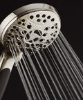 Boss-Level High Pressure 6-Setting Handheld Shower Head With 6-Foot Stainless Hose, water flowing from rub-clean jets