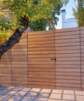 Wooden fence with Heavy Duty Reversible Gate Slide Latch 7.8 Inch Black With WeatherGuard Outdoor Gate Hardware