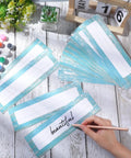 Bulk 60 Sheets Rustic Classroom Name Plates For Desks And Tags Die Cut Flat Nameplates arranged on a white table.
