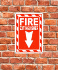 7 Inch By 10 Inch Fire Extinguisher Sign Made From Rust Free Aluminum With Bold Text And Symbol For High Visibility Easy Install With Pre Drilled Holes Durable Indoor Outdoor Safety Sign mounted on a brick wall