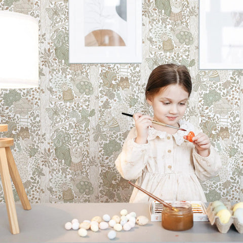 Girl painting in room with Kid Friendly Peel And Stick Wallpaper With Boho Woodland Forest Vibe For Cabinets And Nursery Walls Removable Self Adhesive Decor For Bedroom Cute Animal Theme 393 Inches Long By Seventeen Point Three Inches Wide.