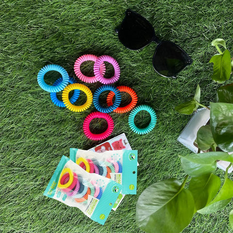 18 Pack Mosquito Repellent Bracelets With 60 Patch Refills, DEET-Free Insect Repellent Wrist Bands for Kids and Adults on grass