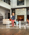 Super Wide Baby Gate And Play Yard For Large Openings Expands To 192 Inches Wide Eight Panel Gate in living room with family and pets