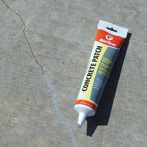 Concrete Repair Patch And Crack Filler, Premixed Cement Repair In Gray, 5.5 Oz Squeeze Tube on concrete surface