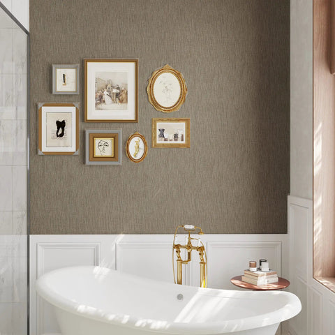 Bathroom wall featuring Taupe Grasscloth Wallpaper Peel And Stick 32 Inch Wide By 354 Inch Long Roll Self Adhesive Textured Faux Grasscloth Contact Paper For Cabinets Walls And Furniture With Easy Install 78.46 Sq Ft Coverage No Mess Removable with framed art above a white bathtub.