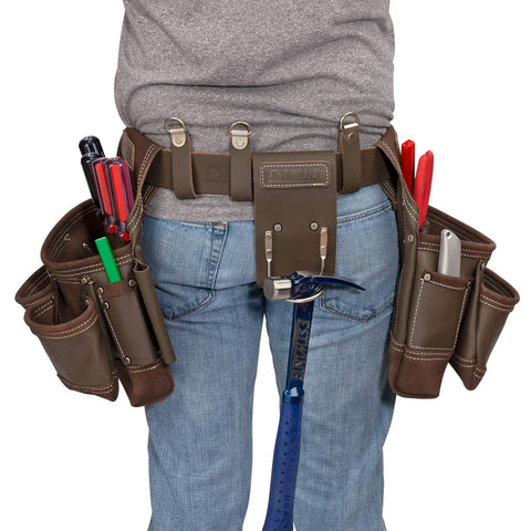 Person wearing 14 Pocket Framer Tool Belt Set With Tough As Nails Pro Grade Full Grain Leather, Rivet Reinforced Corners