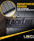 Close-up of heavy duty 2 inch 18 foot ratchet straps with reinforced edges, black, for secure tie downs on trucks and trailers.