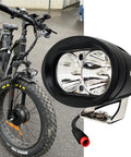 Beast Bright White LED E Bike Headlight 6000K for Rad Power Bikes with Mounting Hardware, attached to a black e-bike frame.