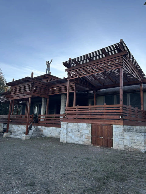 Dark Walnut Wood Stain For Decks And Fences on modern wooden home exterior showcasing semi transparent finish.
