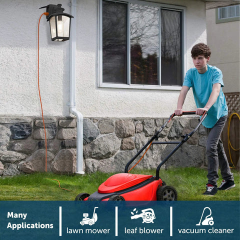 Teen mowing lawn with Go-To Outdoor Wall Lantern 1 Light With Seeded Glass And Built In GFCI Outlet Black Finish in background