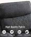 Close-up of electric power recliner chair with soft fabric upholstery overstuffed heavy duty sofa chair dark gray