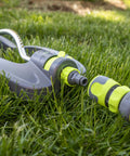 Garden Hose Nozzle Kit, 3-Piece With Quick Connect Sprayer And Flow Stop Adapter shown on grass lawn