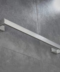 Stainless Steel 24 Inch Towel Bar Rack Wall Mount Towel Holder With Brushed Nickel Finish Modern Bath Towel Rail Heavy Duty Rust Resistant Easy To Clean Durable Single Bar Silver Bathroom Accessory mounted on grey wall.