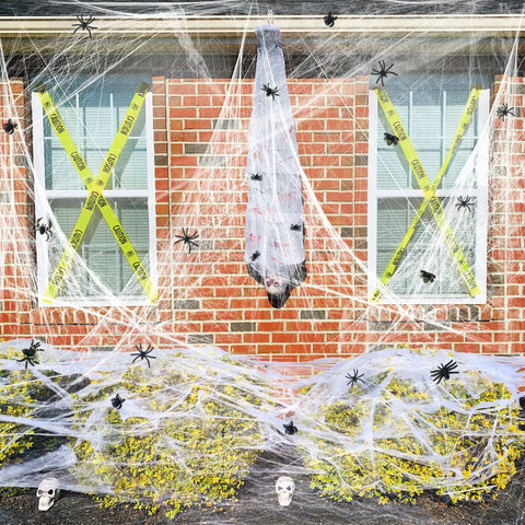 Premium Super Stretchy Halloween Spider Webs Covering 1400 Square Feet With 150 Extra Fake Spiders for creepy outdoor decor.