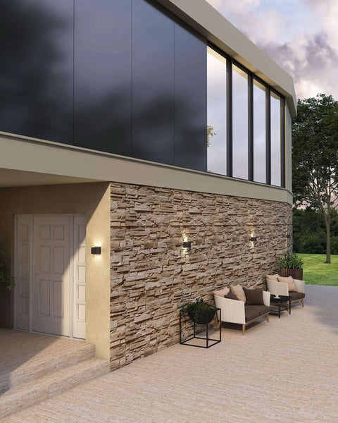 Modern facade with Dope 4 Inch Square LED Wall Sconce for indoor and outdoor use; die cast aluminum housing, evening view.
