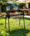 Foldable Charcoal Grill With Three Temperature Settings, Windproof Camping BBQ in garden with food and spices