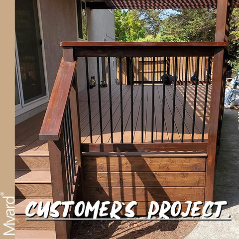 Wooden deck with 26 Inch Grooved Aluminum Deck Balusters Hollow Round Rail Spindles Matte Black 50 Pack railing upgrade.