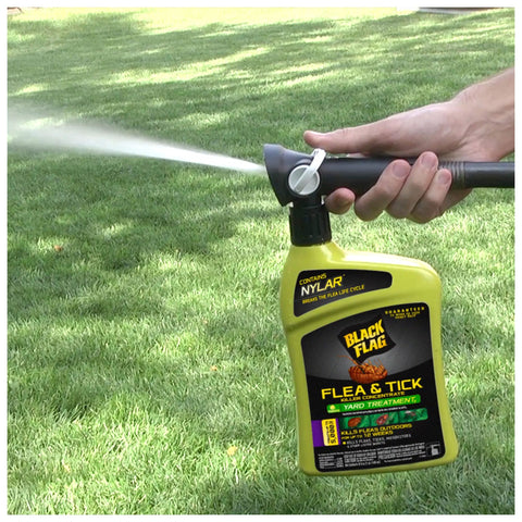 Flea And Tick Killer Concentrate For Yard Control Ready To Spray 32 Ounces With Quickflip Hose End Sprayer in action on lawn
